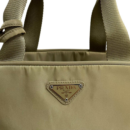Prada green nylon duffel bag with logo detail and working lock and key.