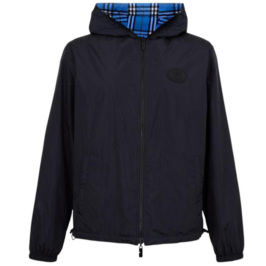 Burberry reversible windbreaker jacket in blue and black with Nova Check pattern.