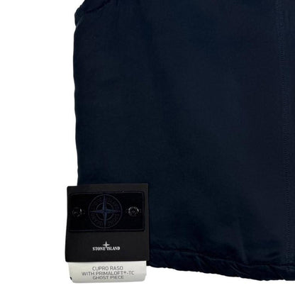 Stone Island navy blue vest jacket with logo patch and Primaloft material.