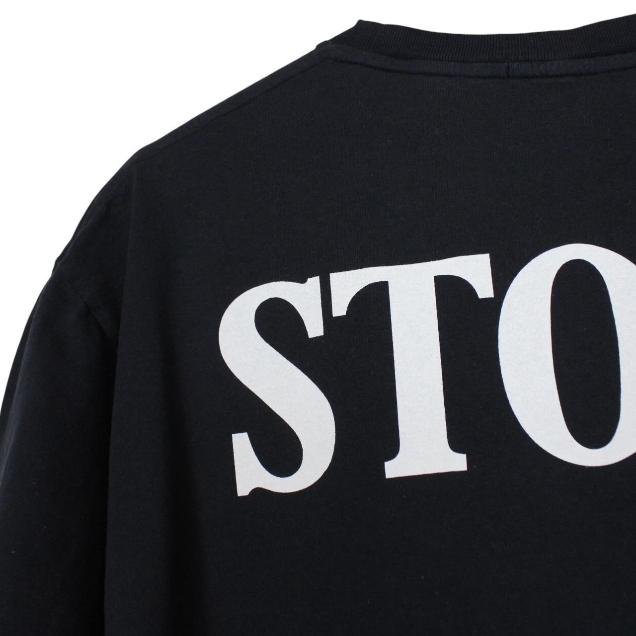 Stone Island navy blue short sleeve t-shirt with compass logo on chest pocket.