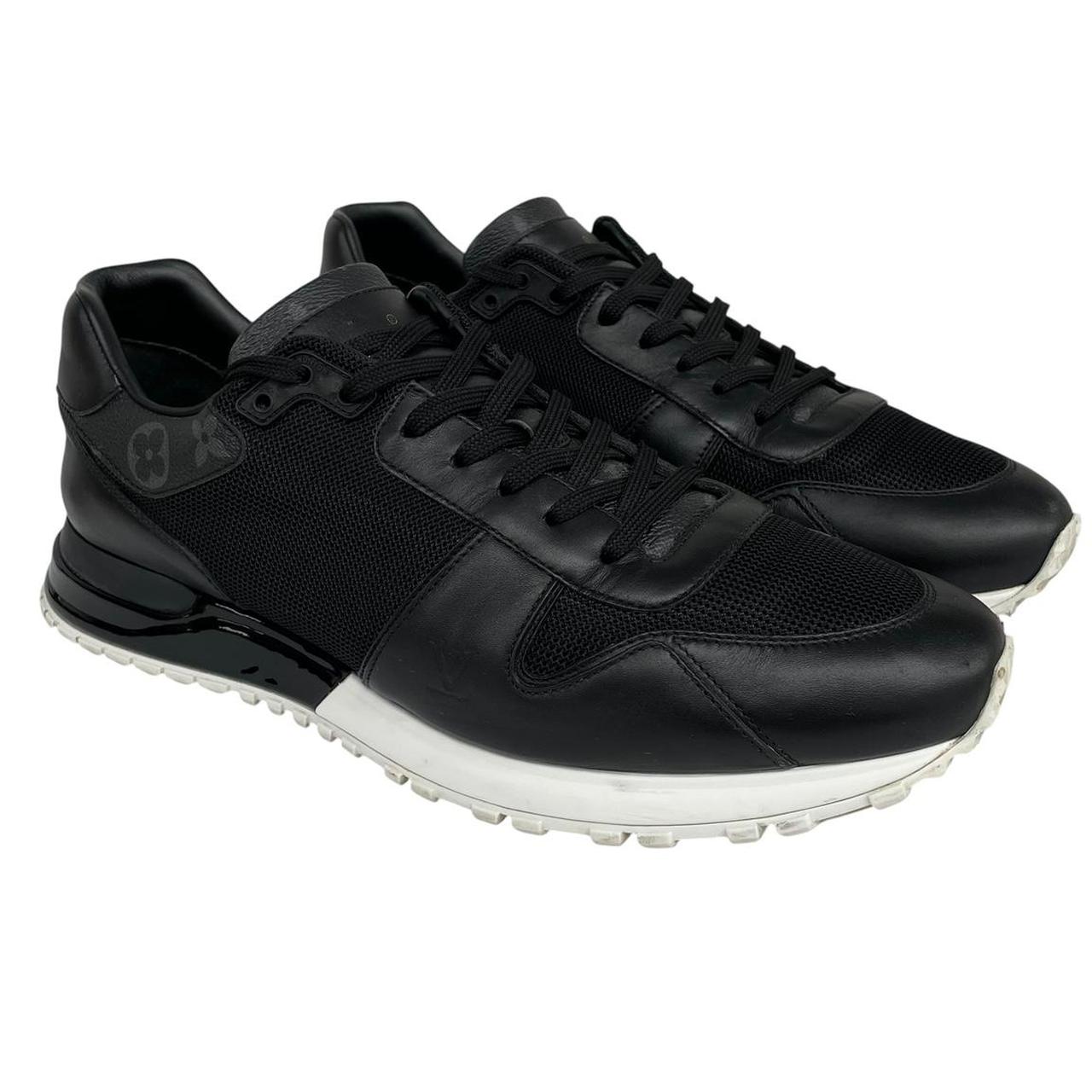 Louis Vuitton black trainers featuring monogram pattern and leather-mesh material.
