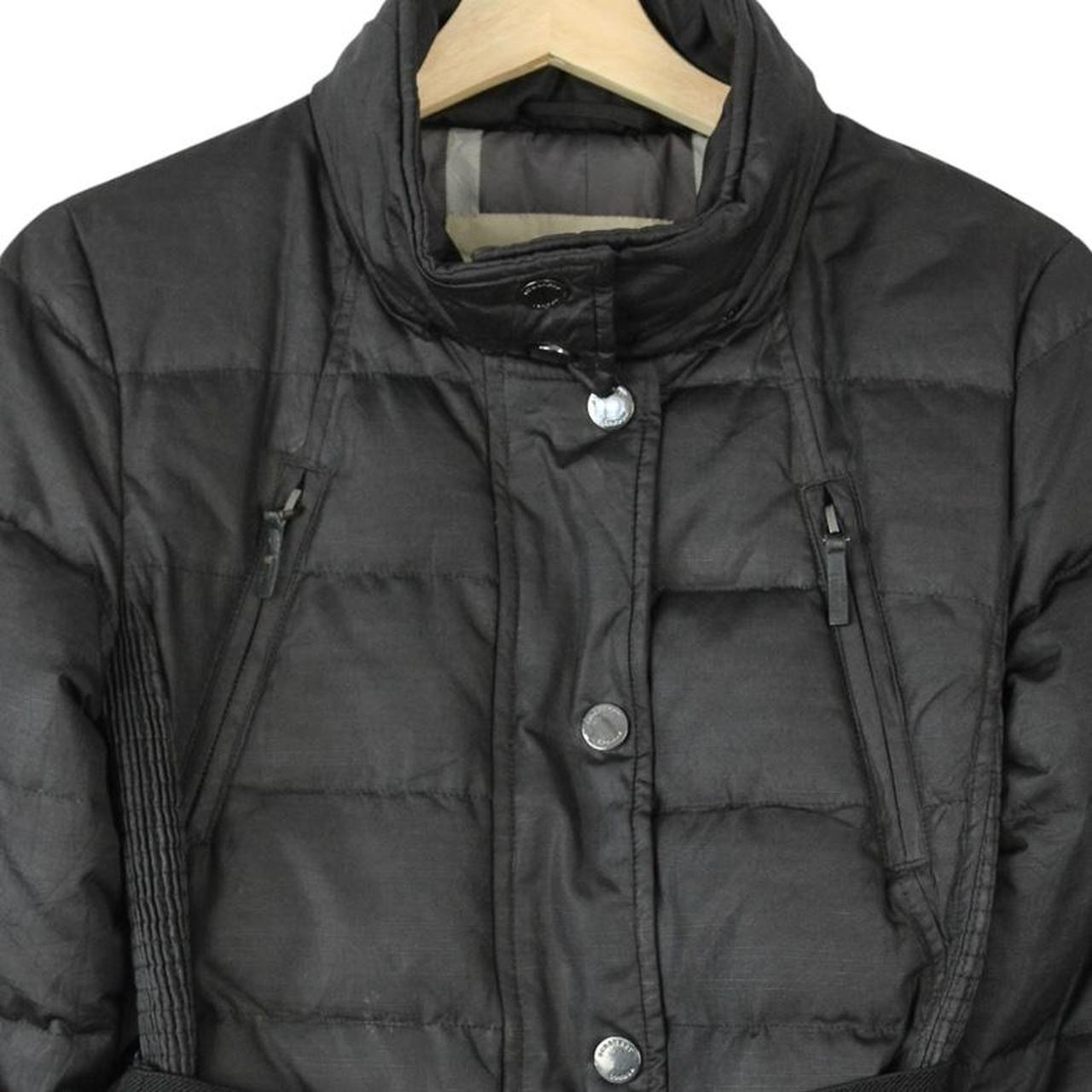 Burberry black puffer coat with Nova Check pattern and belted waist detail.