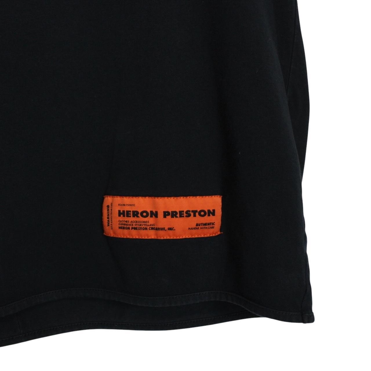 Heron Preston black pocket t-shirt with multicoloured birds print and oversized fit.