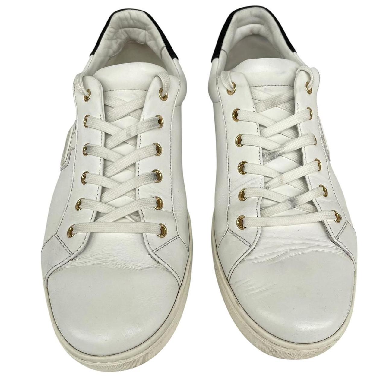 Dolce & Gabbana white and navy blue leather trainers with logo detailing and creased toe box.