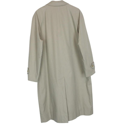 Burberry khaki green trench coat featuring Nova Check pattern and single breasted design.