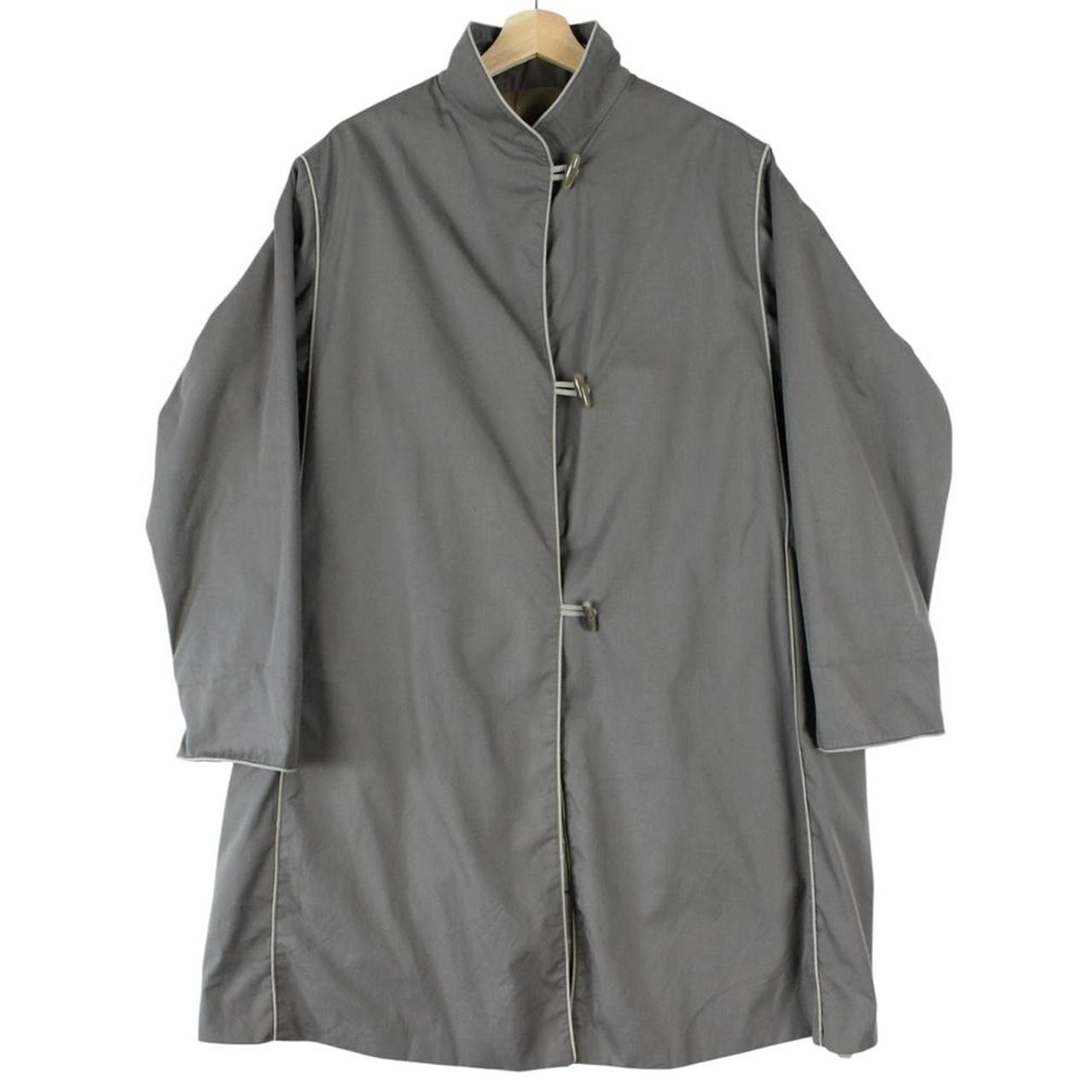 Burberry grey trench coat, single breasted, classic design, vintage 80s style.