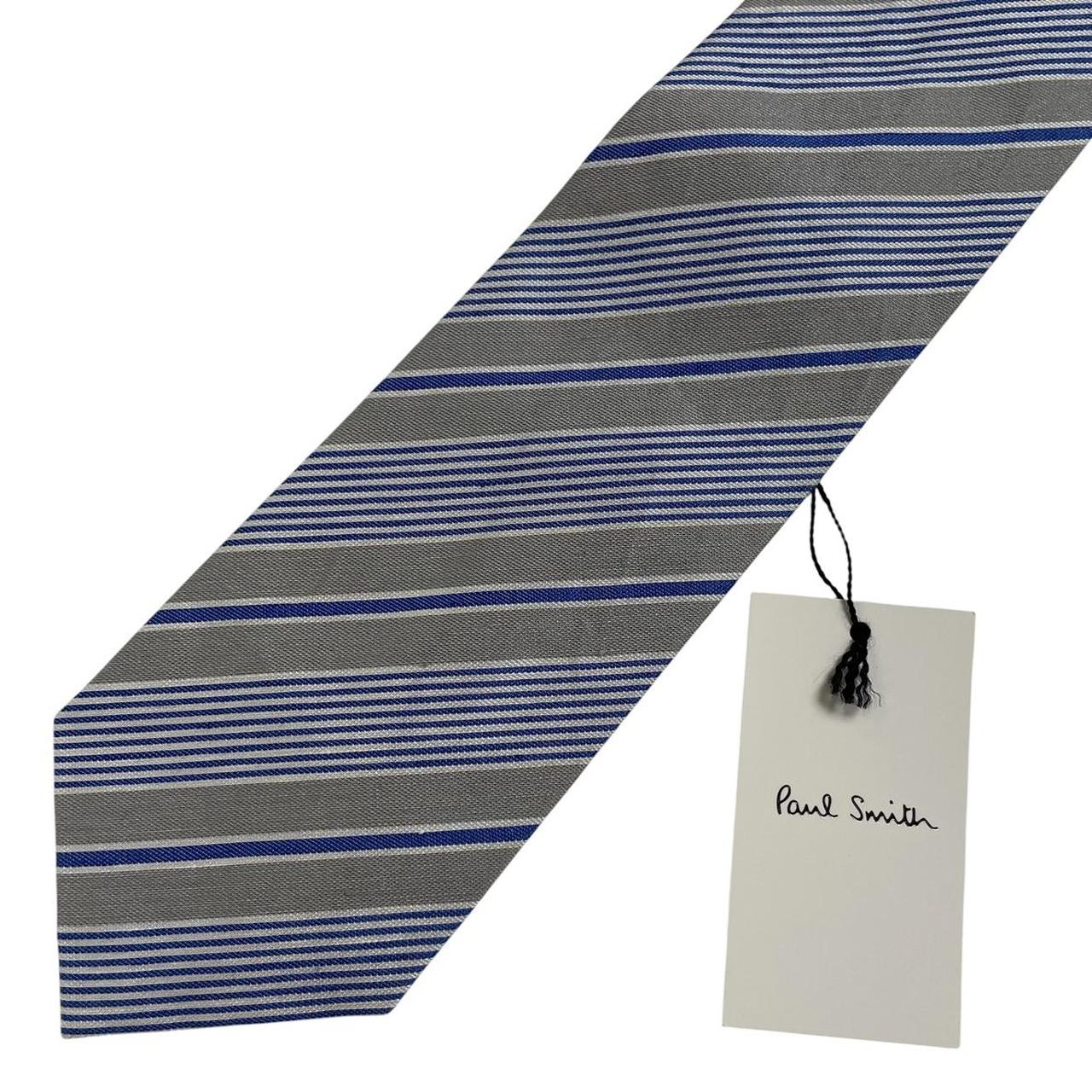 Paul Smith blue and grey striped tie in cotton/silk blend with logo detail.