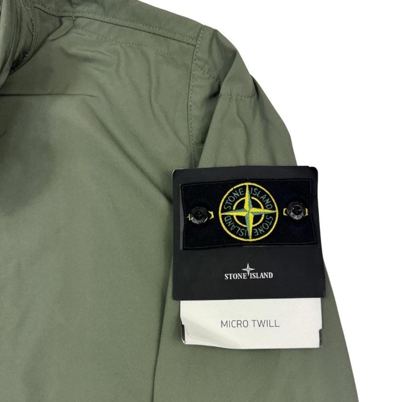 Stone Island green full zip micro twill jacket with removable woven brand patch.