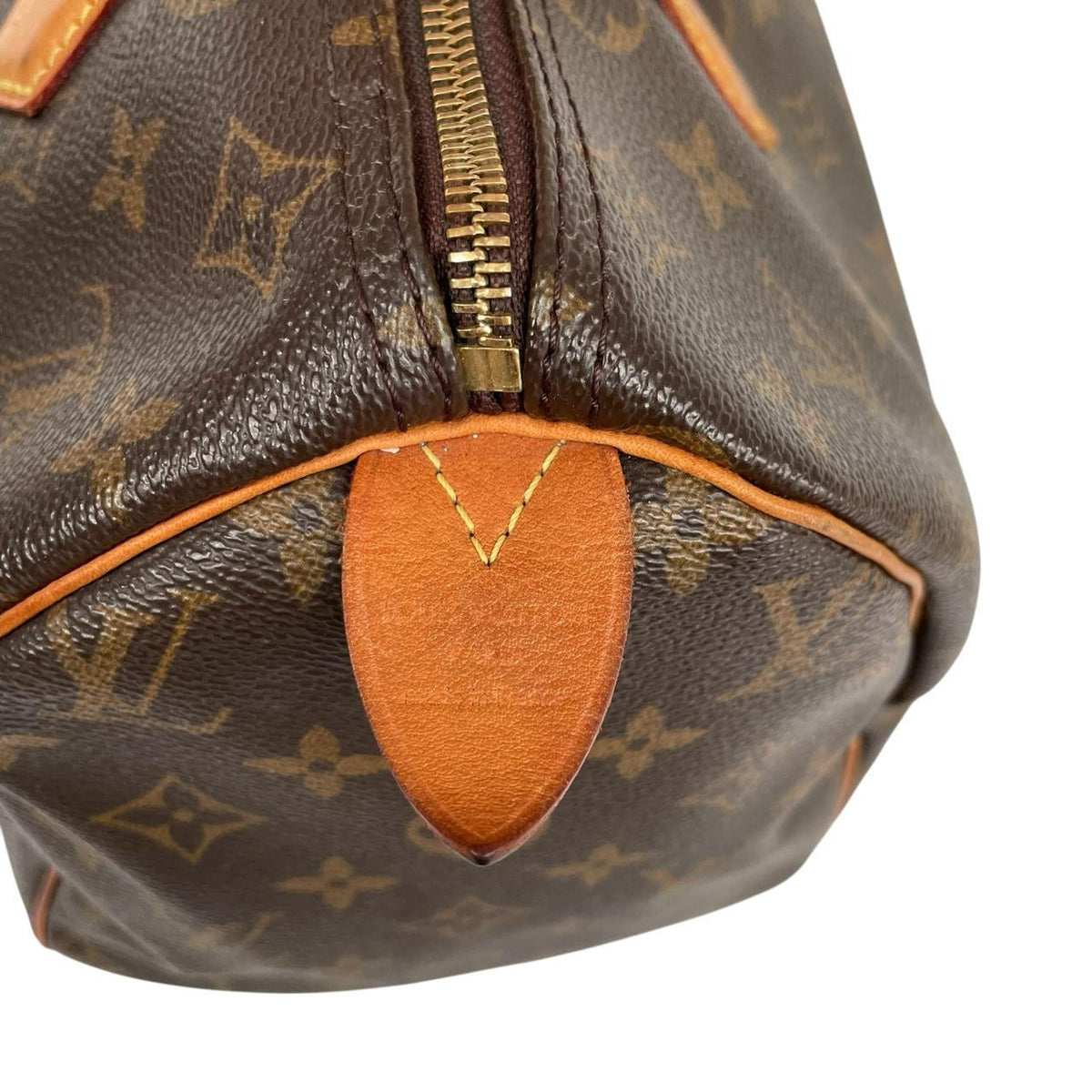 Louis Vuitton beige and brown monogram coated canvas shopping tote with padlock detail.