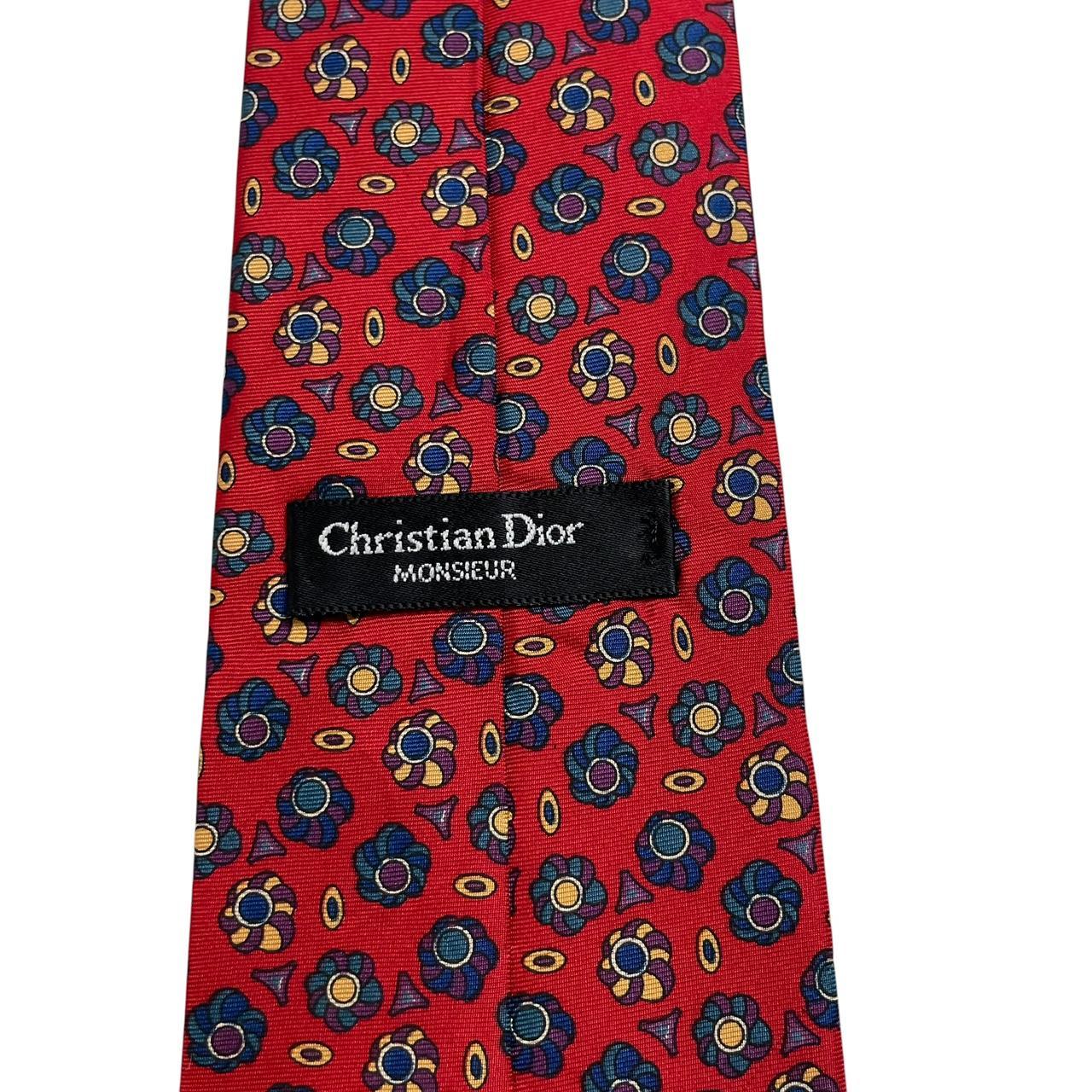Christian Dior multicoloured silk tie featuring intricate patterns and luxurious sheen.