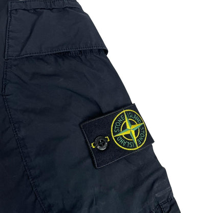 Stone Island navy blue cargo trousers with logo patch and RE-T fit design.