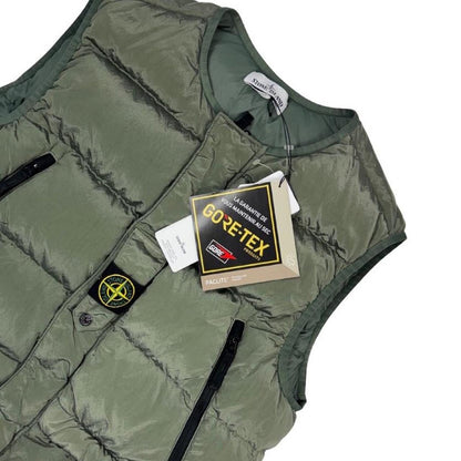 Stone Island black quilted gilet with Gore-Tex logo and ripstop material.