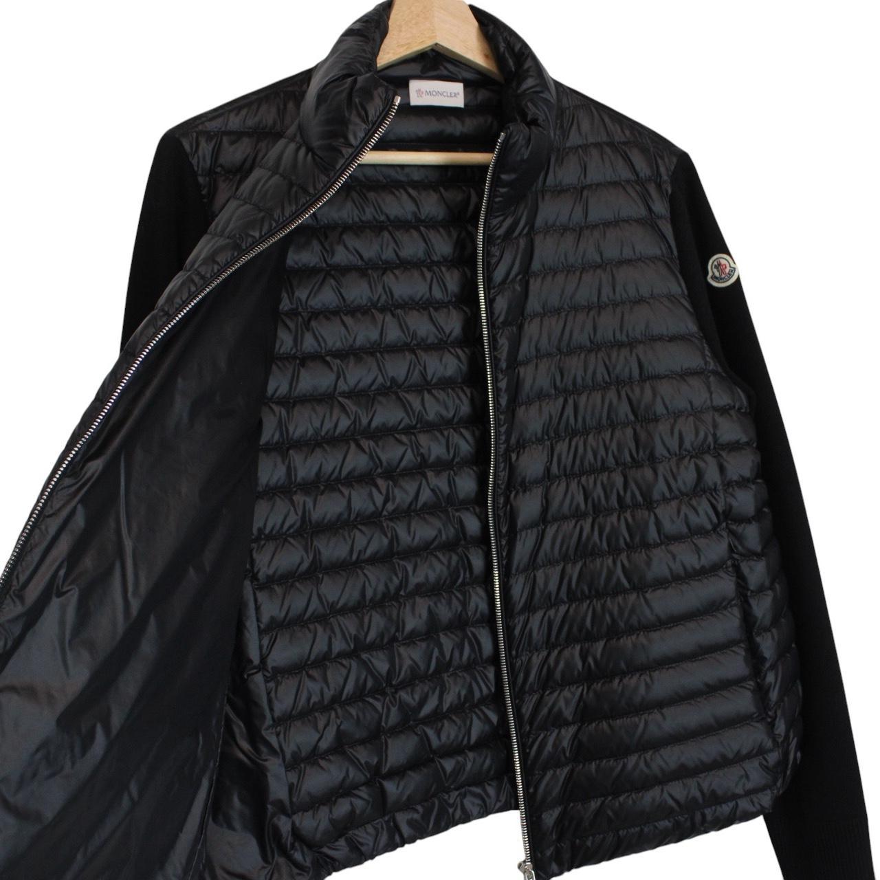 Moncler black cardigan jacket with full zip, down tricot material, and logo detail.