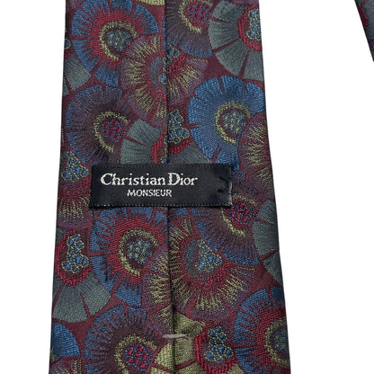 Christian Dior multicoloured tie featuring intricate patterns in silk and polyester.