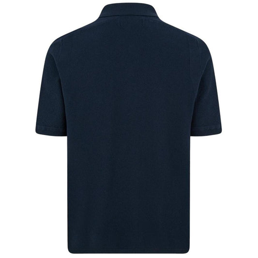Stone Island navy blue polo shirt with Compass patch and three-button placket.
