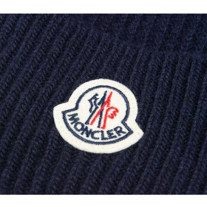 Moncler navy blue ribbed cotton beanie hat with logo tag and brand new condition.