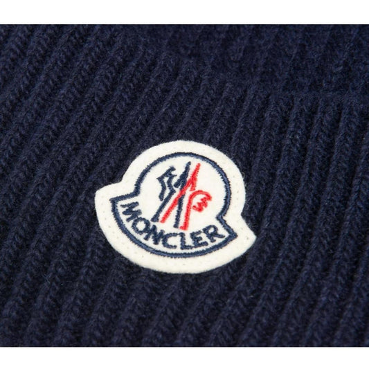 Moncler navy blue ribbed cotton beanie hat with logo tag and brand new condition.