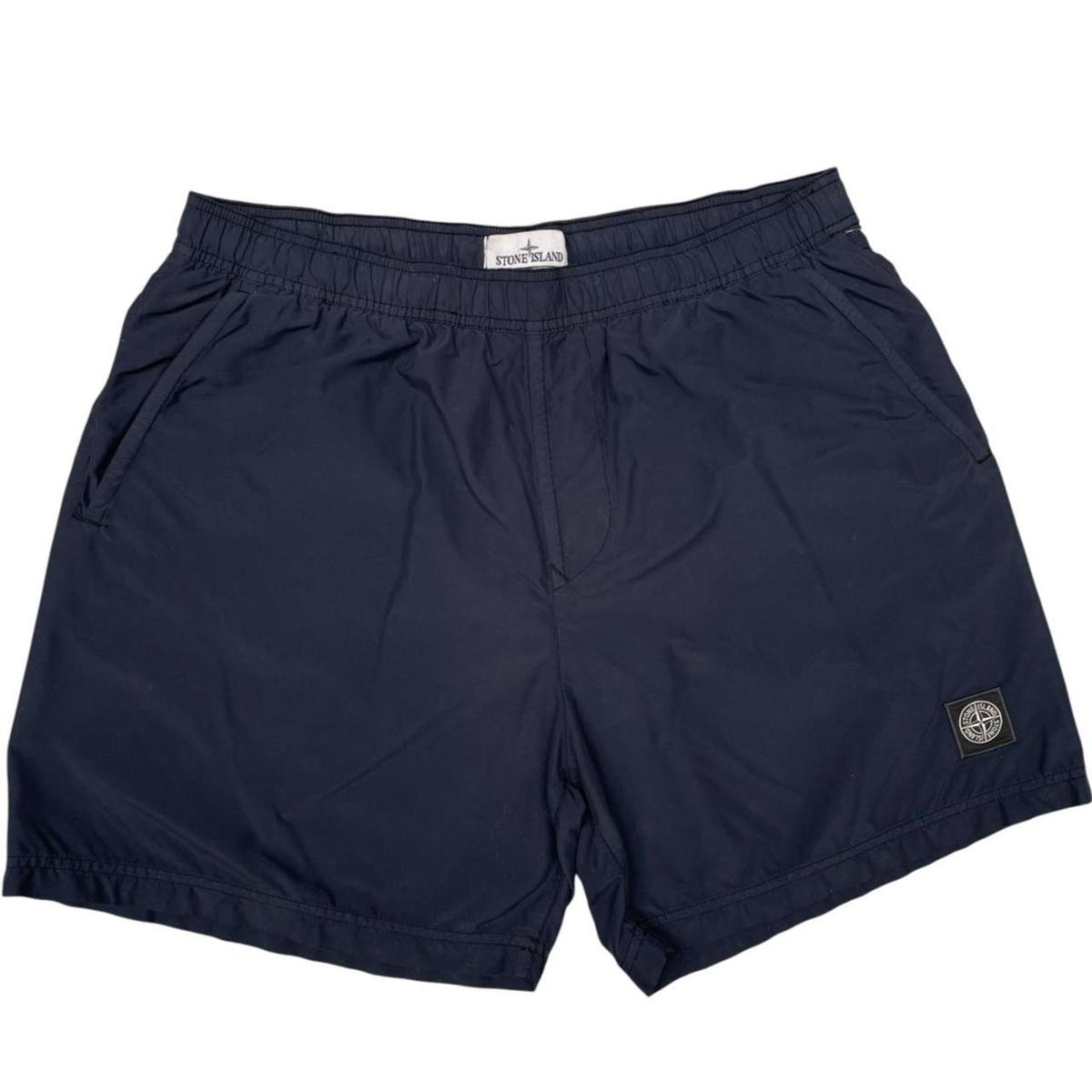 Stone Island navy blue swim shorts brushed nylon fabric with logo patch on side.