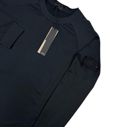 Stone Island black sweatshirt with ghost logo and stretch cotton material.