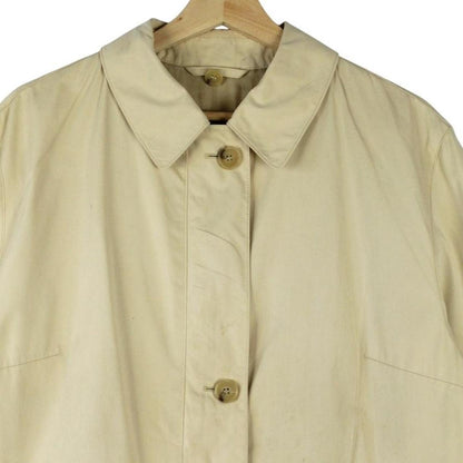Burberry beige single breasted coat with logo detail and classic tailored design.