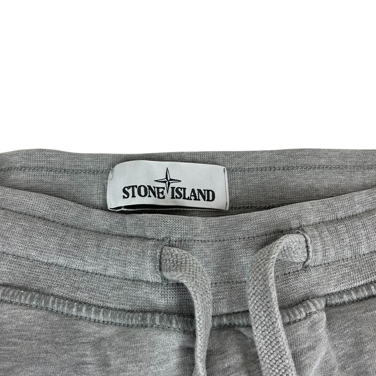 Stone Island grey joggers with logo patch and cotton material, size small.