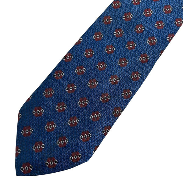 Hugo Boss blue silk tie with smooth texture and subtle sheen.