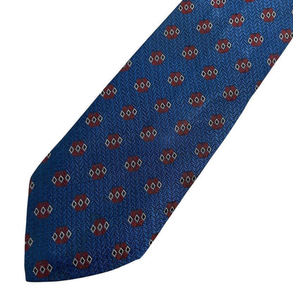 Hugo Boss blue silk tie with smooth texture and subtle sheen.