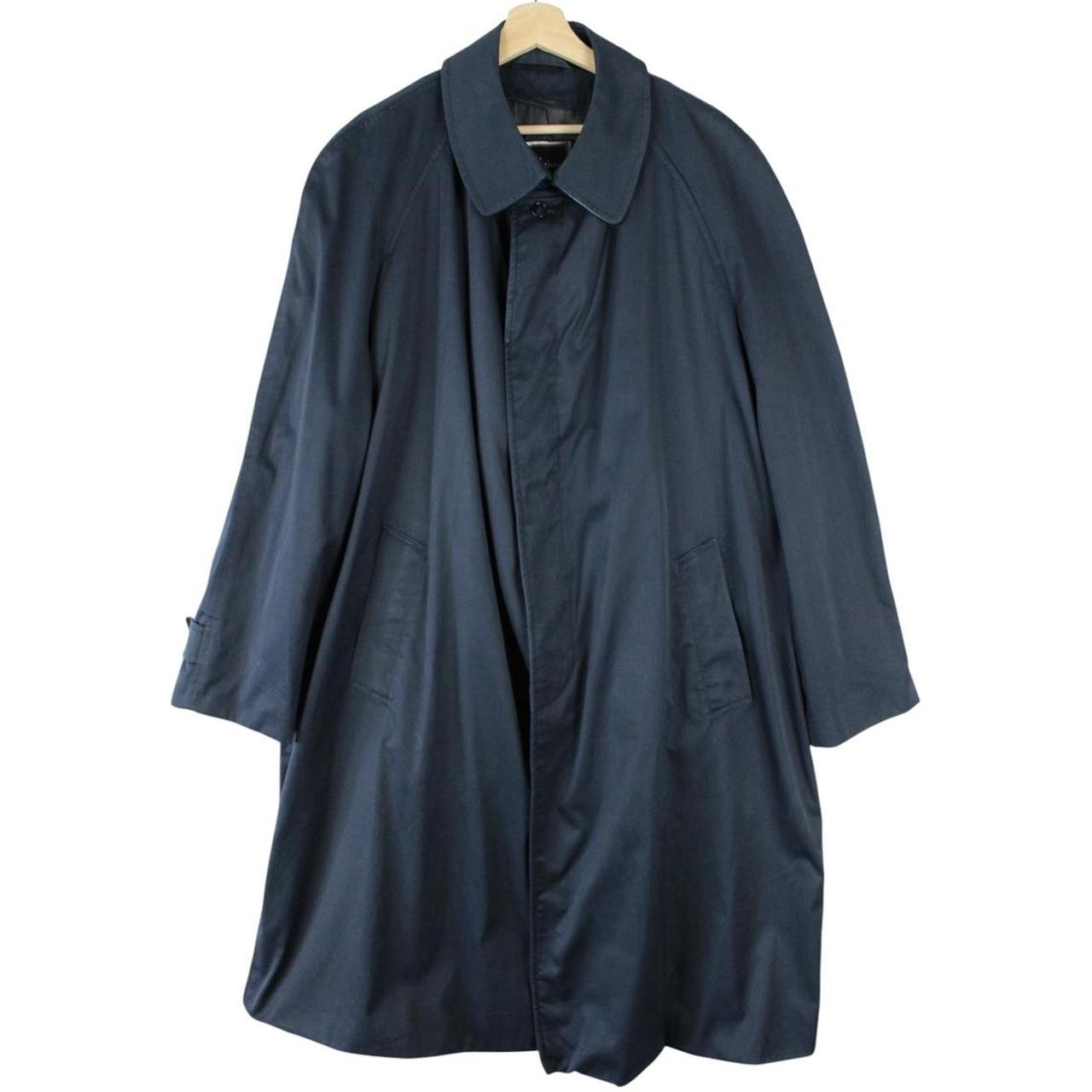 Christian Dior navy blue trench coat, single-breasted, vintage 90s style, classic design.