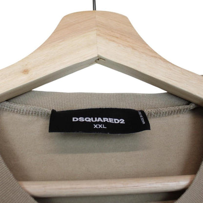 Dsquared2 tan brown pocket t-shirt featuring Caten twins print and cotton material.