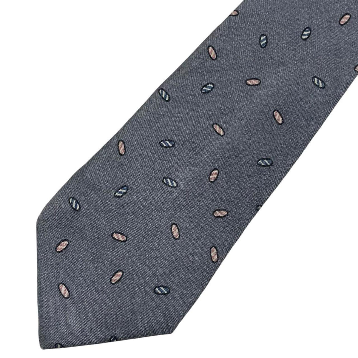 Christian Dior grey silk tie with abstract print and logo detail.