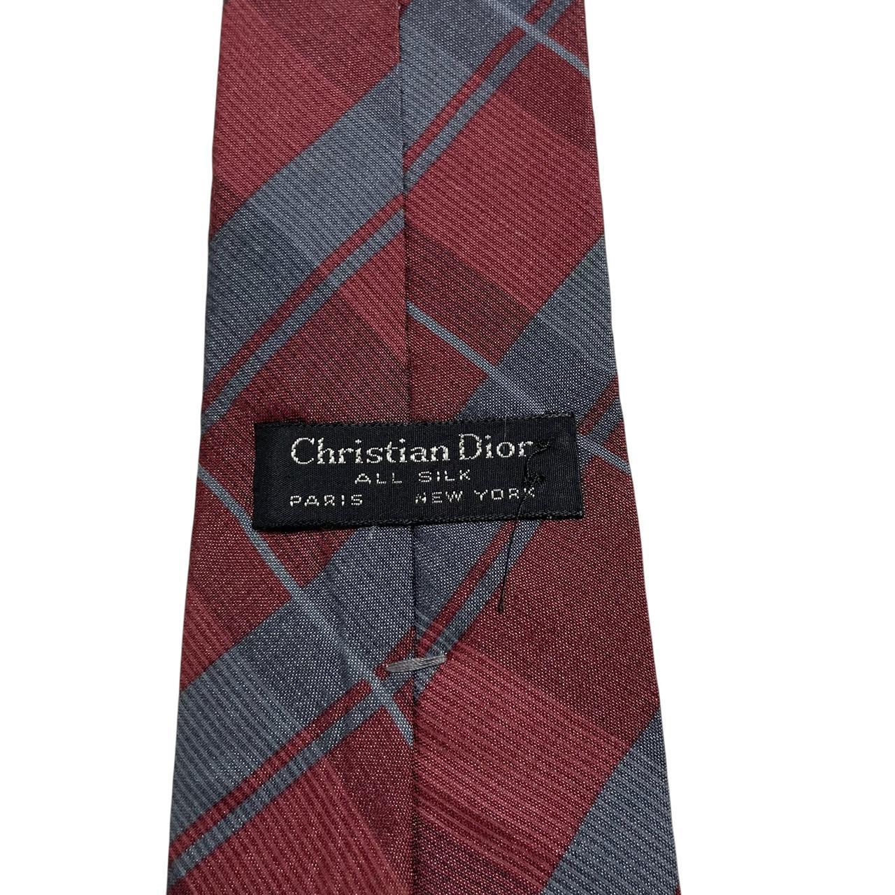 Christian Dior silk tie burgundy and blue check pattern with logo detail.
