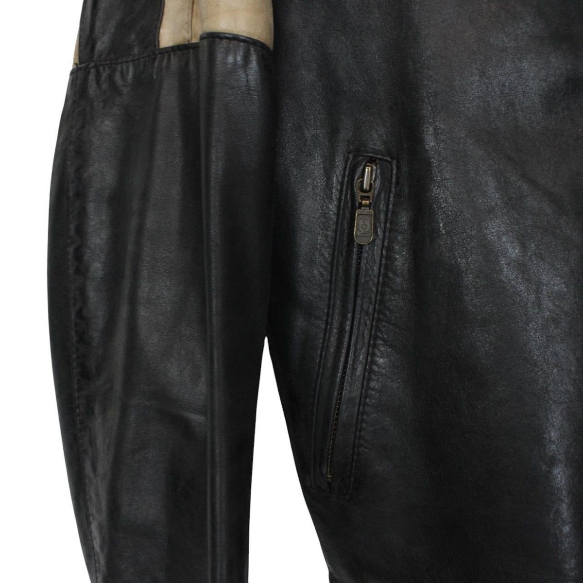 Belstaff beige and black leather jacket with vintage logo and cream detailing.