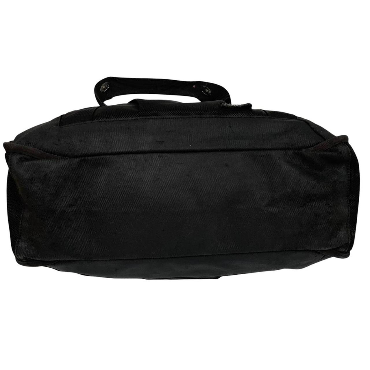 Stone Island black nylon tote bag with logo patch and crossbody strap.