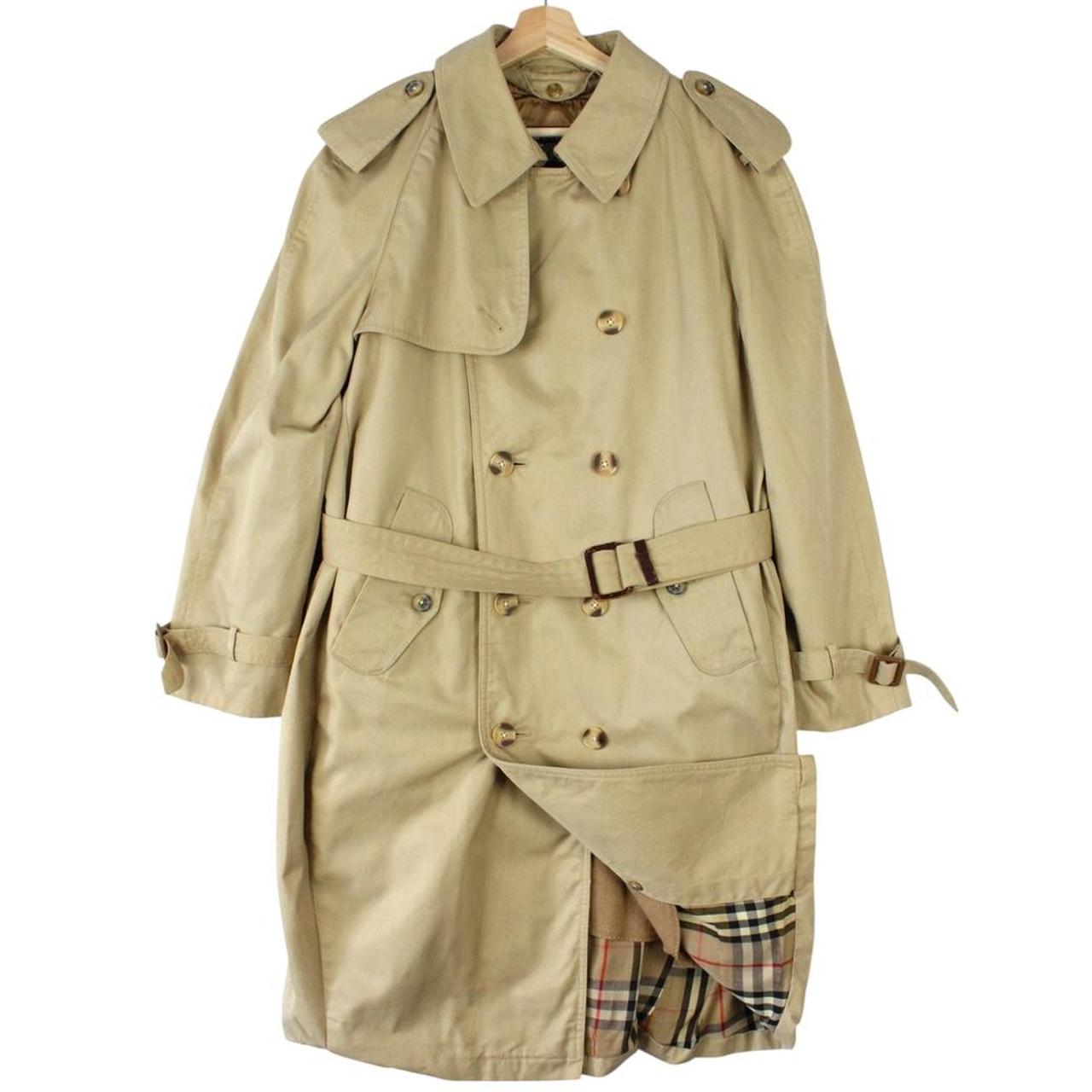 Burberry beige trench coat with Nova Check pattern, double breasted and belted design.