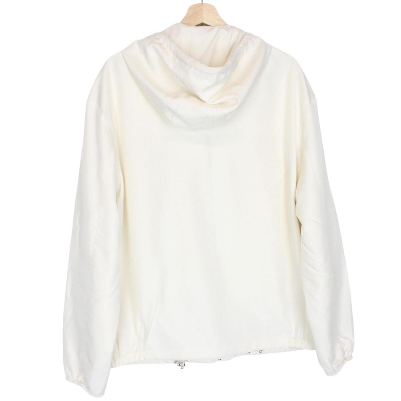 Prada cream silk hooded jacket with triangle logo and full zip detail.