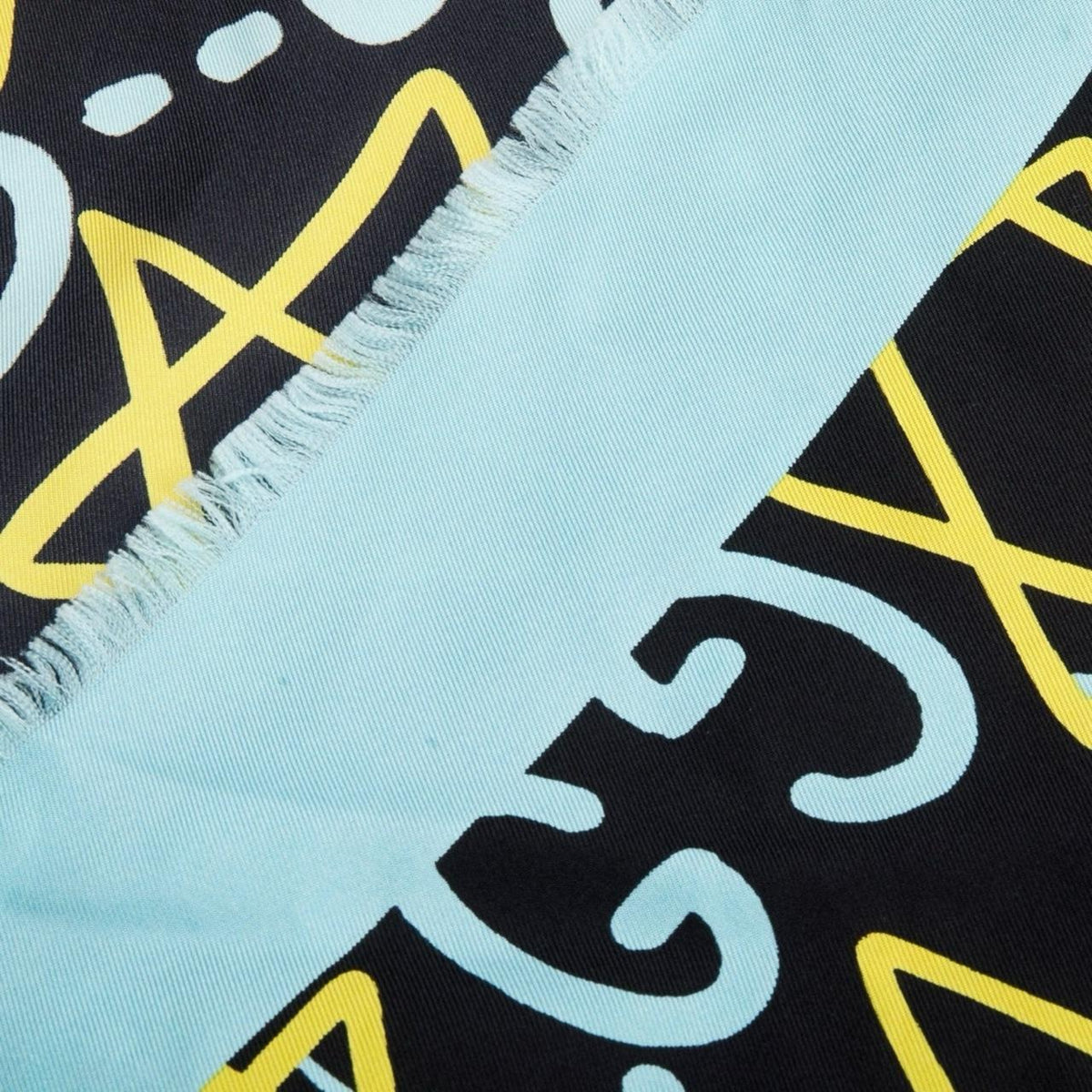 Gucci black and blue modal silk scarf with GG star pattern and logo.