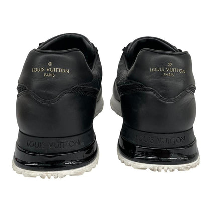 Louis Vuitton black trainers featuring monogram pattern and leather-mesh material.