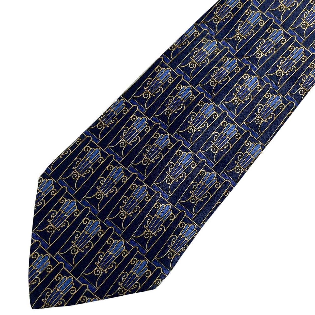 Lanvin silk tie featuring floral geometric print in vibrant colors.