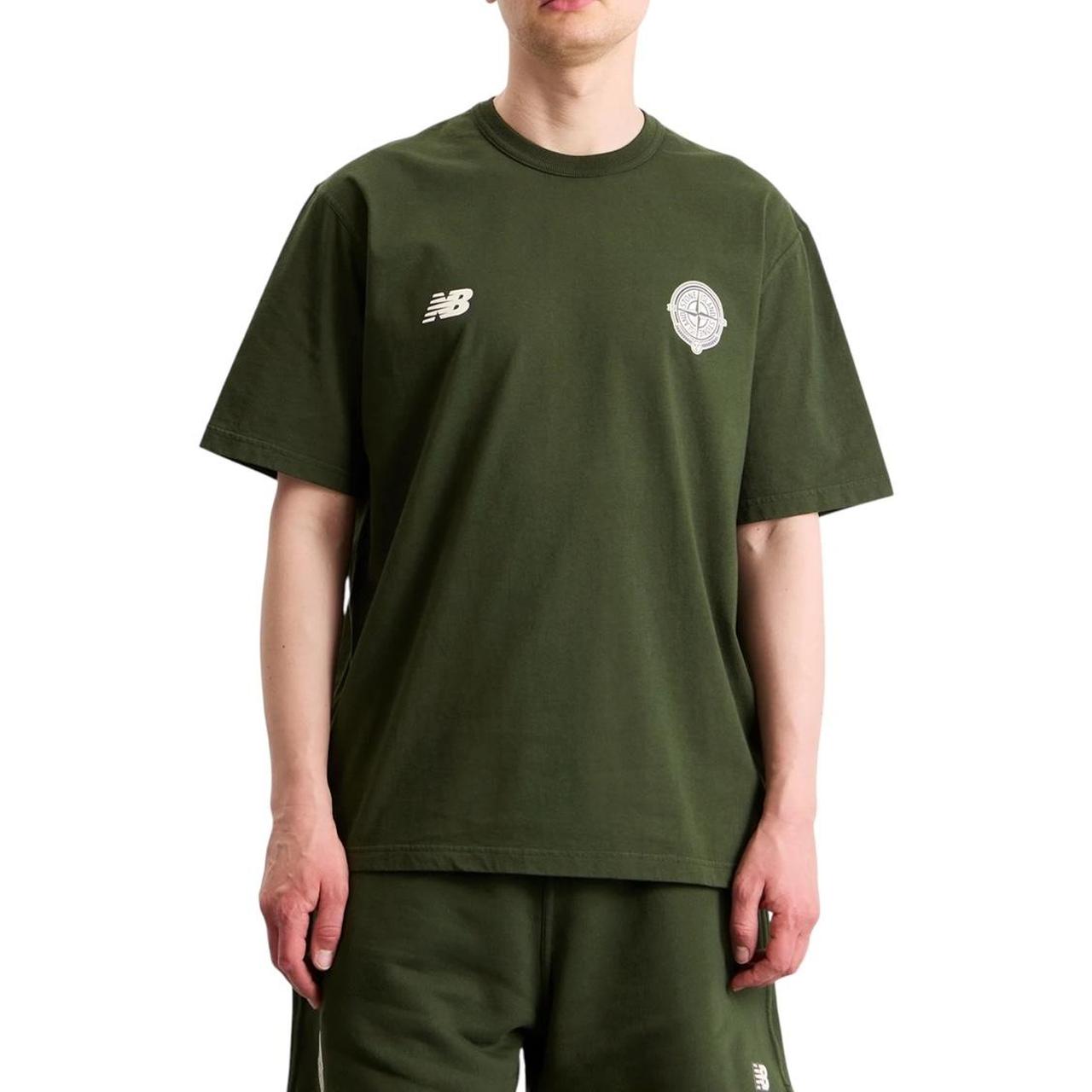 Stone Island green pocket t-shirt with embroidered crest and New Balance logo.