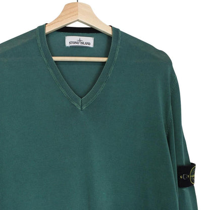 Stone Island green knit v-neck jumper with logo patch on sleeve and ribbed cuffs.