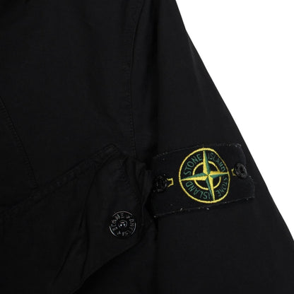 Stone Island black full zip jacket with multi pockets and compass logo detail.