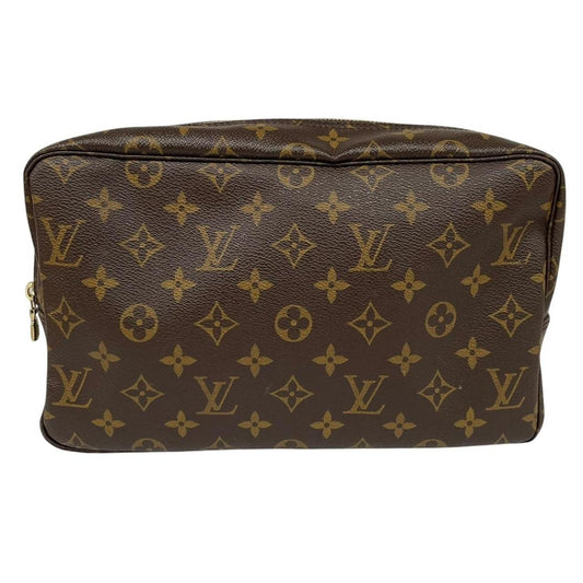 Louis Vuitton brown and tan monogram toiletry pouch with iconic logo and canvas material.