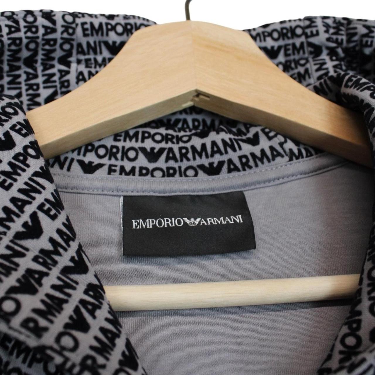 Emporio Armani black and grey hoodie with full zip and logo print design.