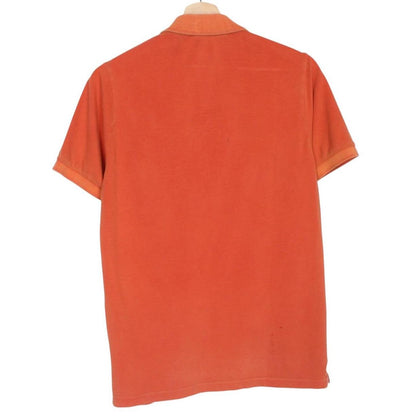 Stone Island orange short sleeve polo shirt with compass logo and cotton material.