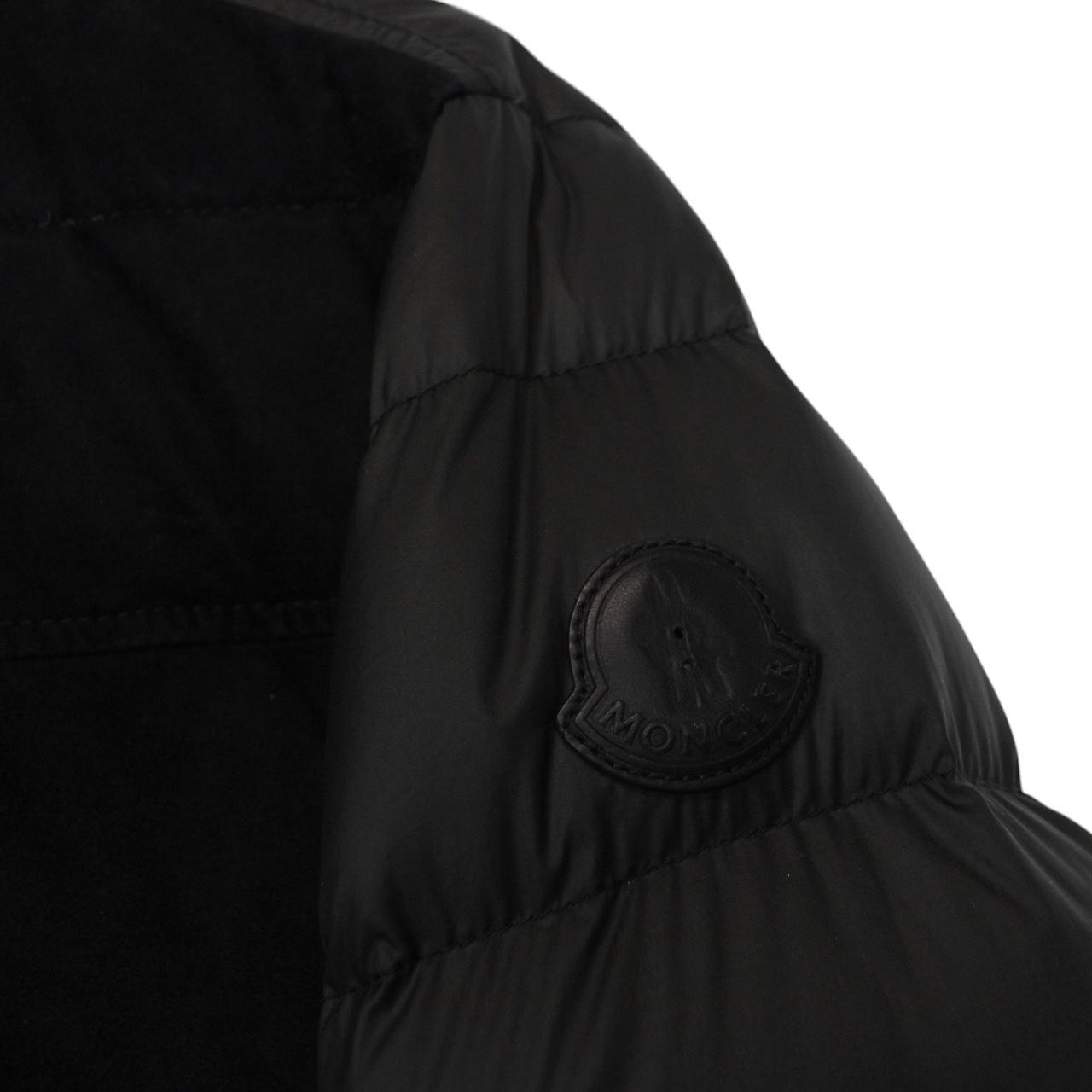 Moncler black suede leather down jacket with full zip and missing badge detail.