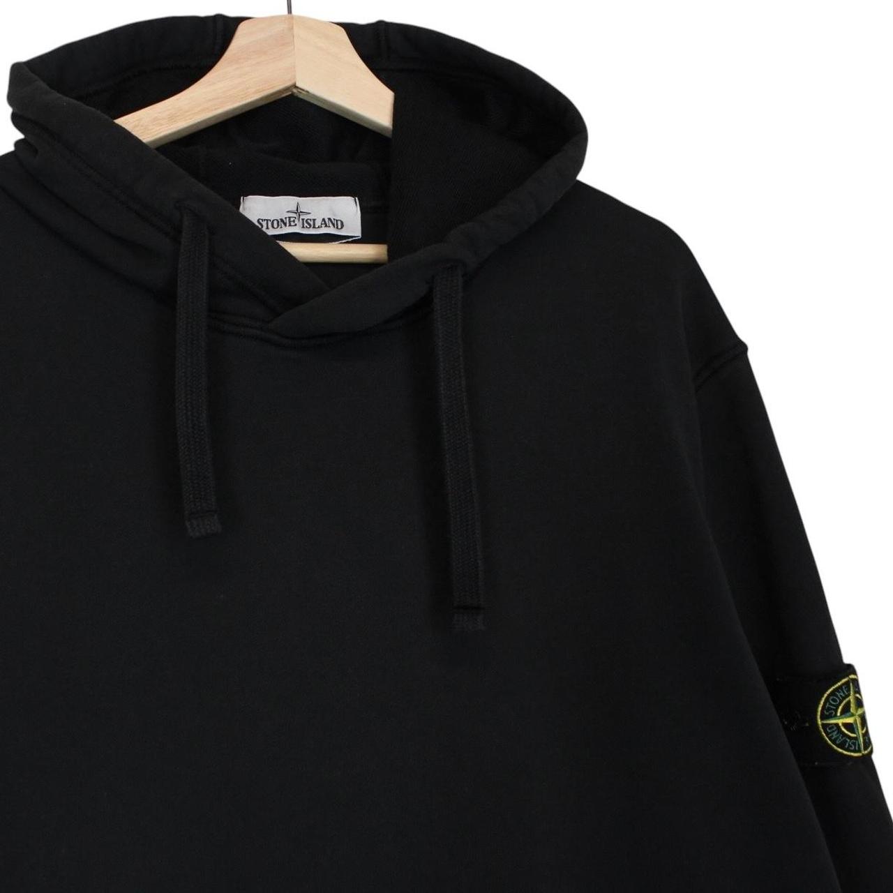 Stone Island black hoodie jumper with embroidered compass logo and cotton material.