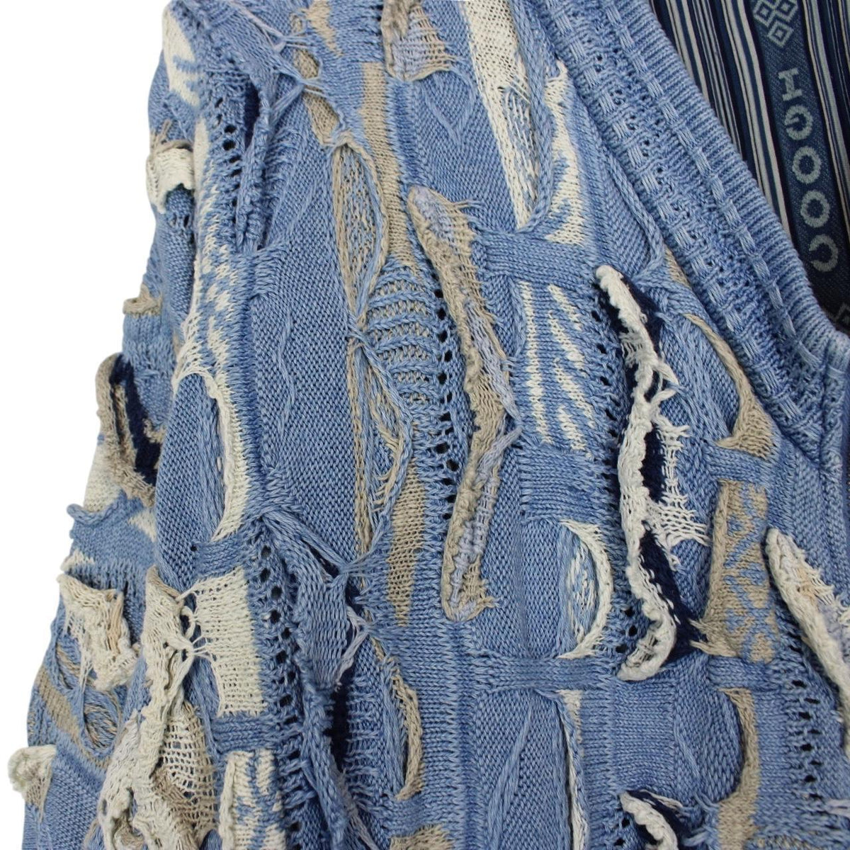 Coogi blue cotton knit full zip cardigan with signature colorful pattern and logo.