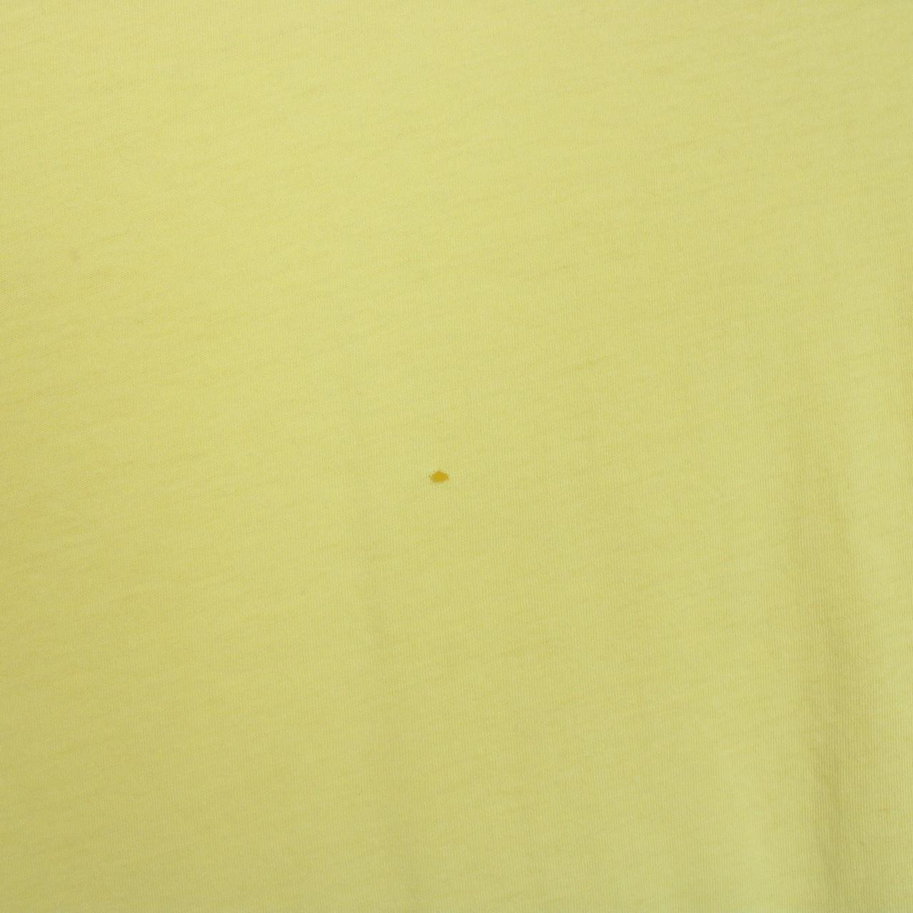 Polo Ralph Lauren yellow short sleeve cotton t-shirt with pocket and logo detail.