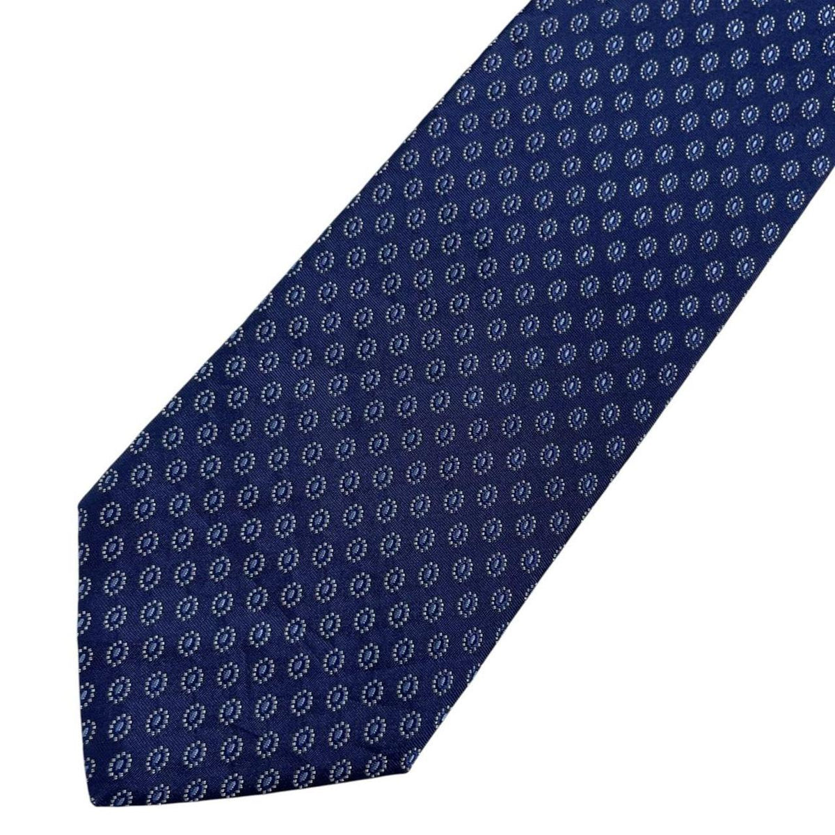 Hugo Boss blue silk tie with smooth texture and subtle sheen.