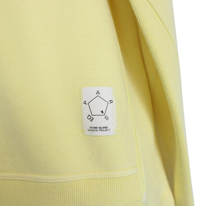 Stone Island yellow v-neck sweatshirt with logo patch and soft cotton material.